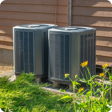 two hvac condensers next to each other